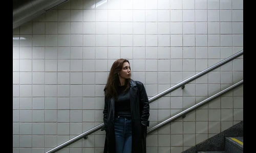 Girl alone in a stairwell. I just want to be alone all by myself