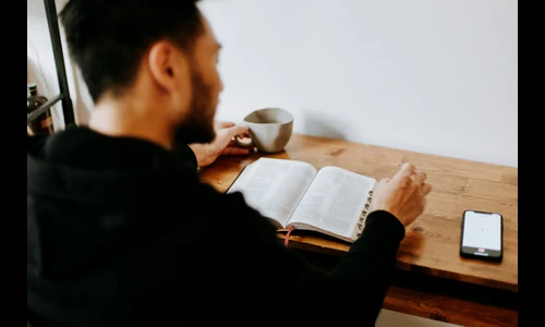 A believer reading scripture Find out how much God loves you.